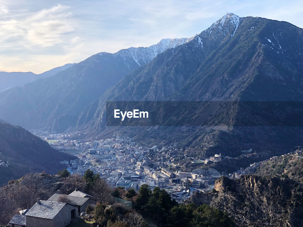 High angle view of townscape against mountains