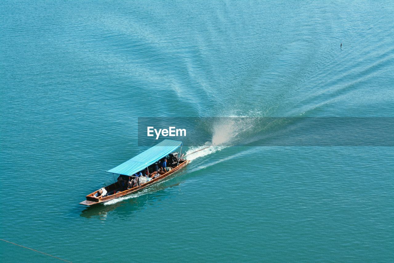 High angle view of boat sailing in sea