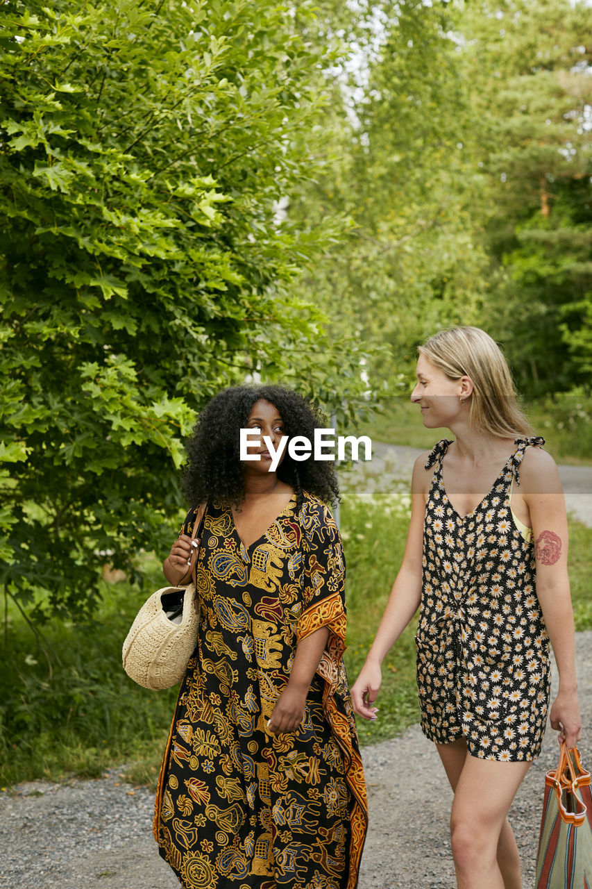 Two young women looking at each other