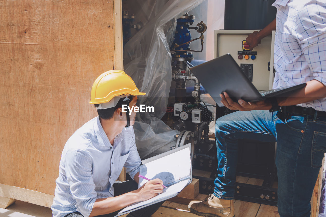 Project engineer, engineer and technician working on construction site