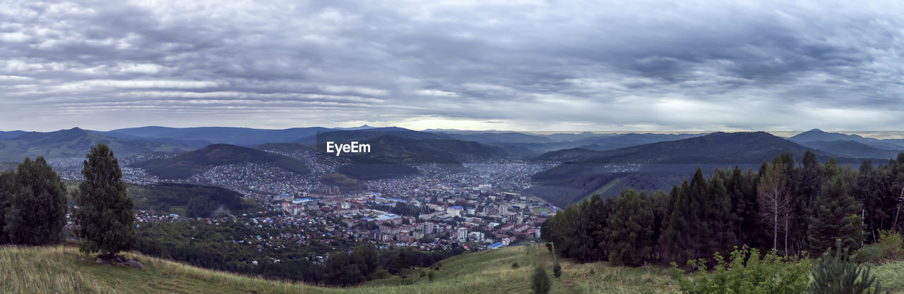 mountain, environment, landscape, scenics - nature, sky, cloud, mountain range, beauty in nature, plant, land, nature, tree, wilderness, ridge, forest, no people, tranquility, valley, tranquil scene, meadow, pine tree, plateau, travel destinations, pinaceae, coniferous tree, outdoors, architecture, travel, rural scene, field, non-urban scene, panoramic, pine woodland, grass, mountain pass, building, tourism, snow, winter, idyllic, day