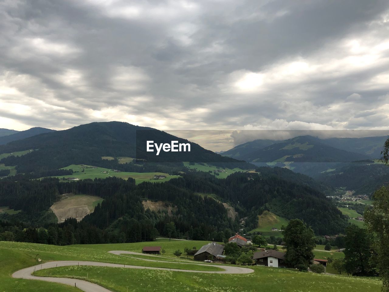 Scenic view of landscape and mountains against sky