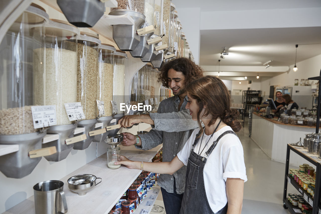 Couple shopping in packaging-free supermarket