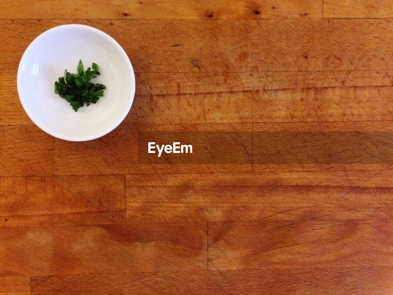 Directly above shot of parsley in plate on table