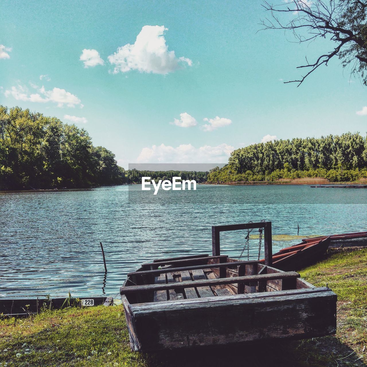 BOAT ON RIVERBANK