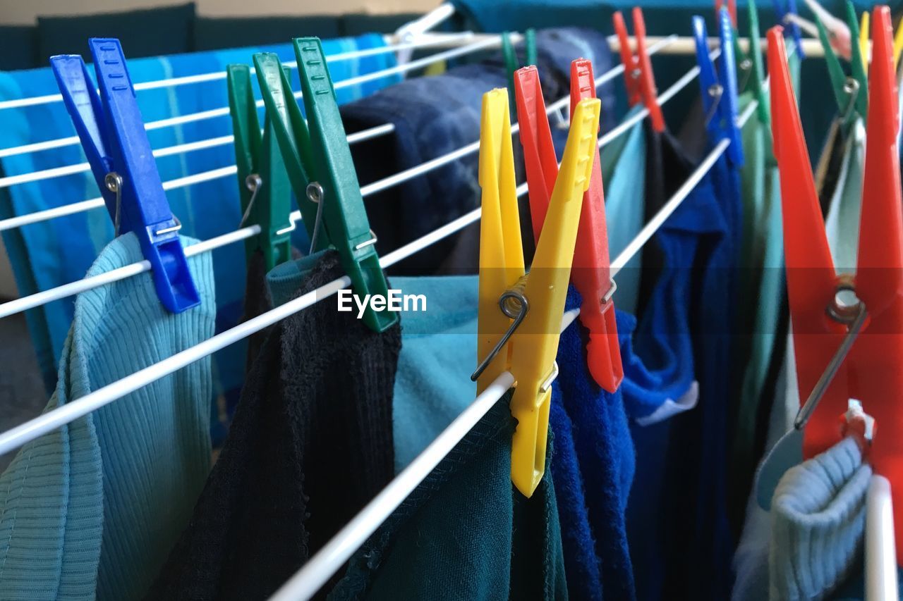 Close-up of laundries hanging on clothesline