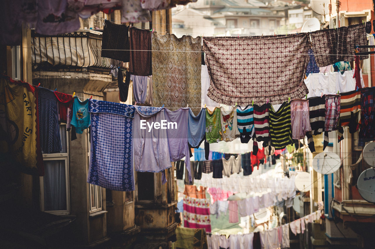 Clothes drying on clothesline between buildings in istanbul 