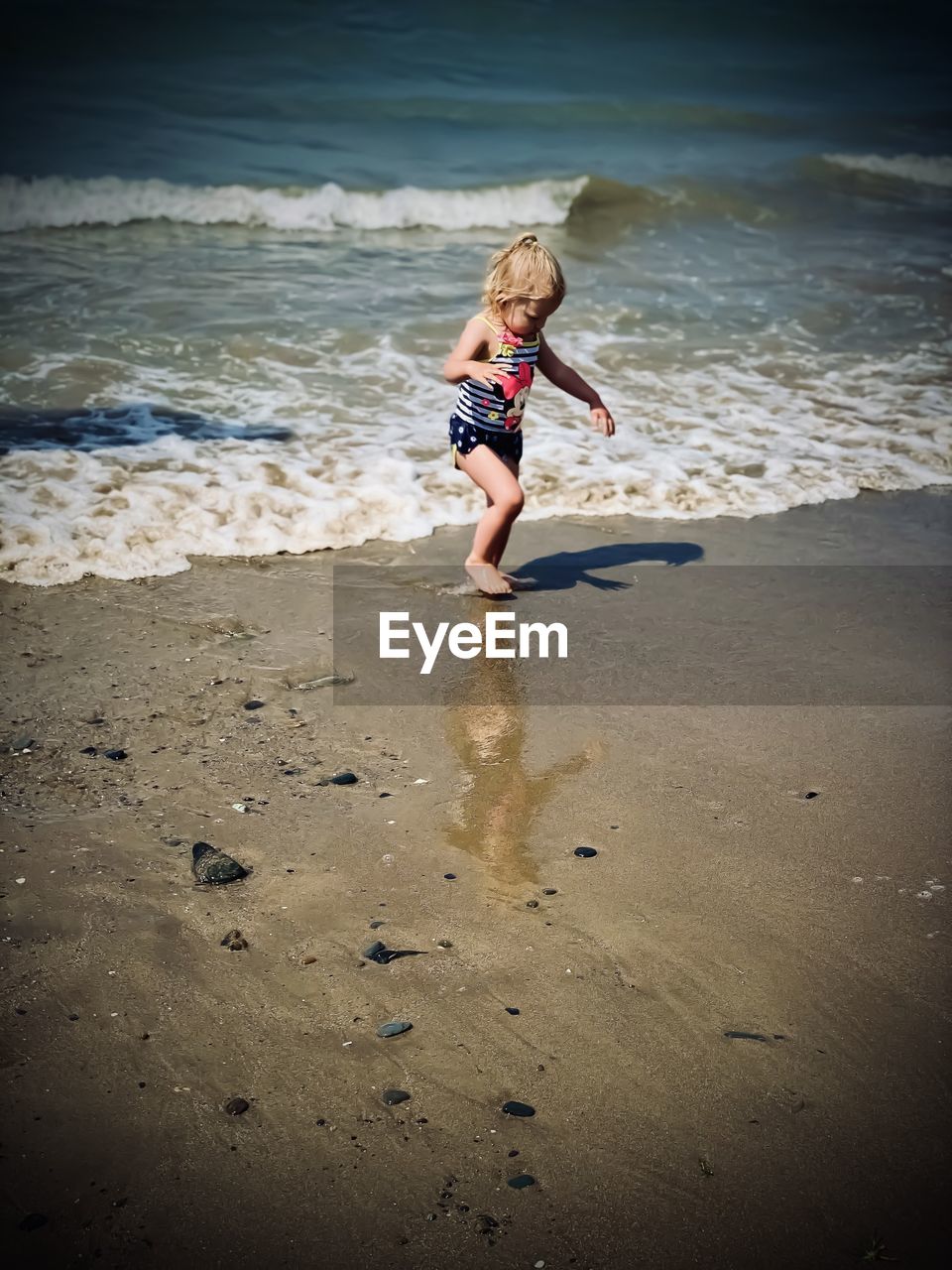 Full length of girl on beach