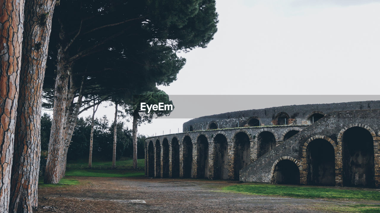 Amphitheatre of pompeii against clear sky