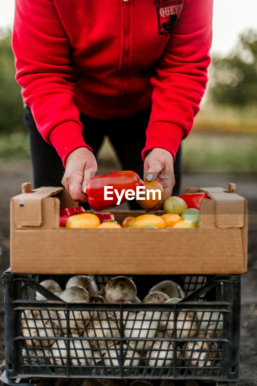 midsection of man holding food