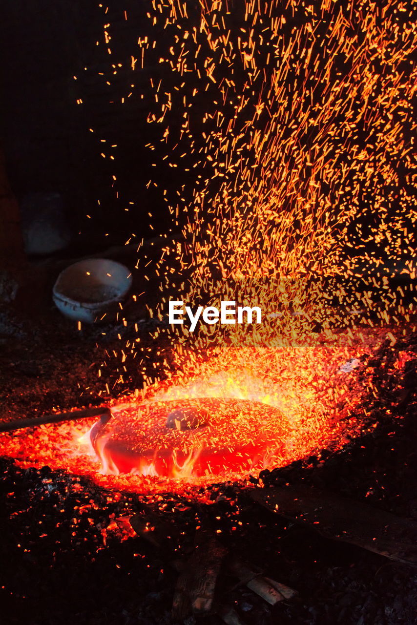 Sparks over furnace at metal industry