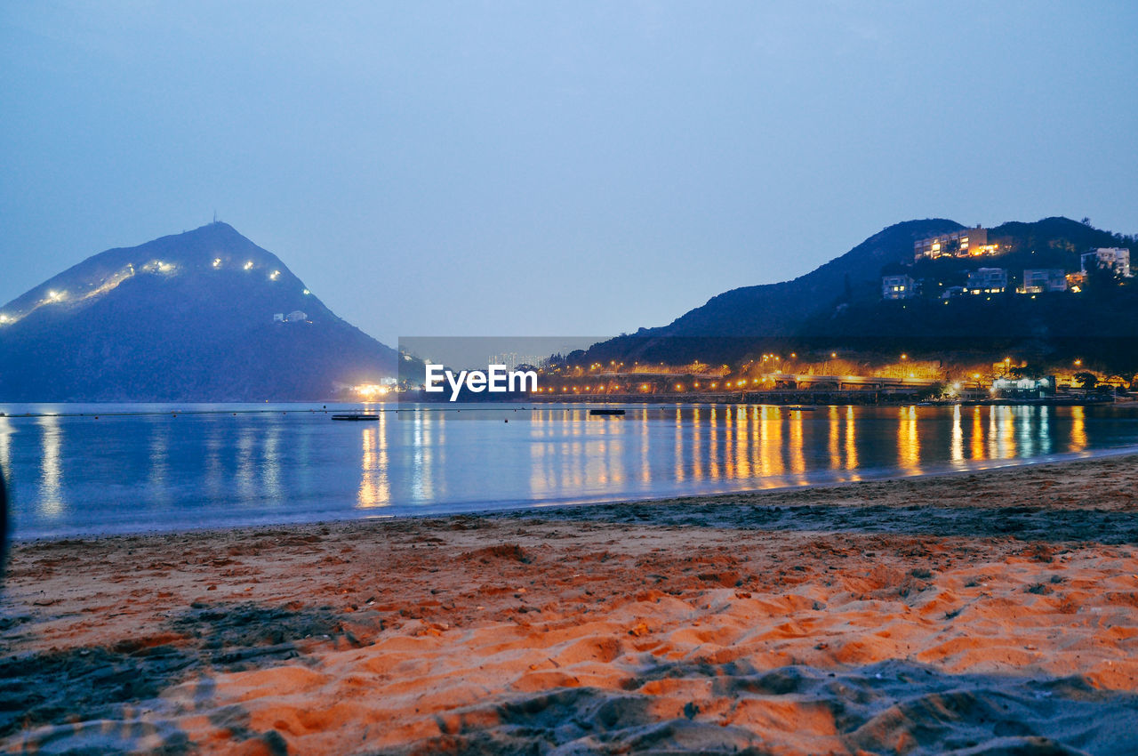 Scenic view of lake at night