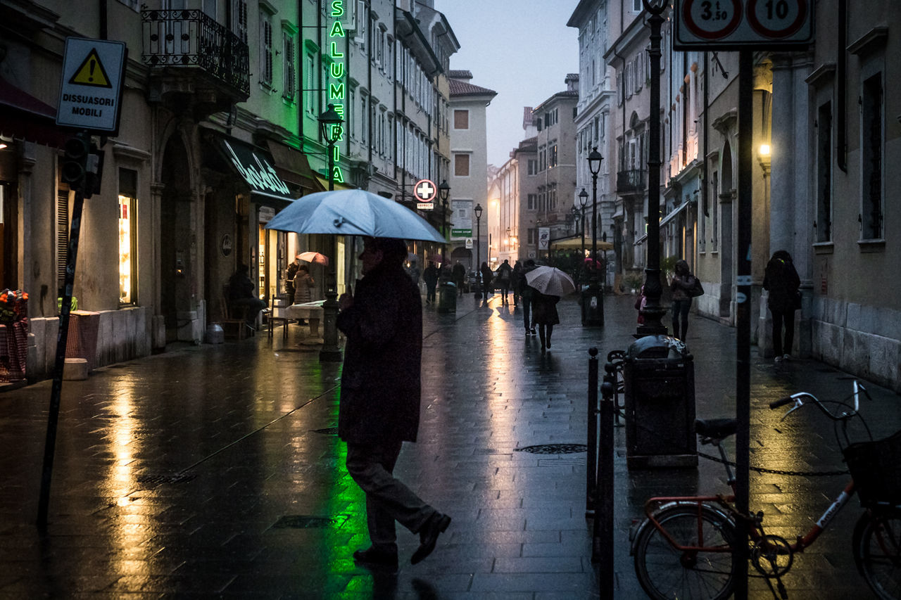 WOMAN WALKING IN CITY