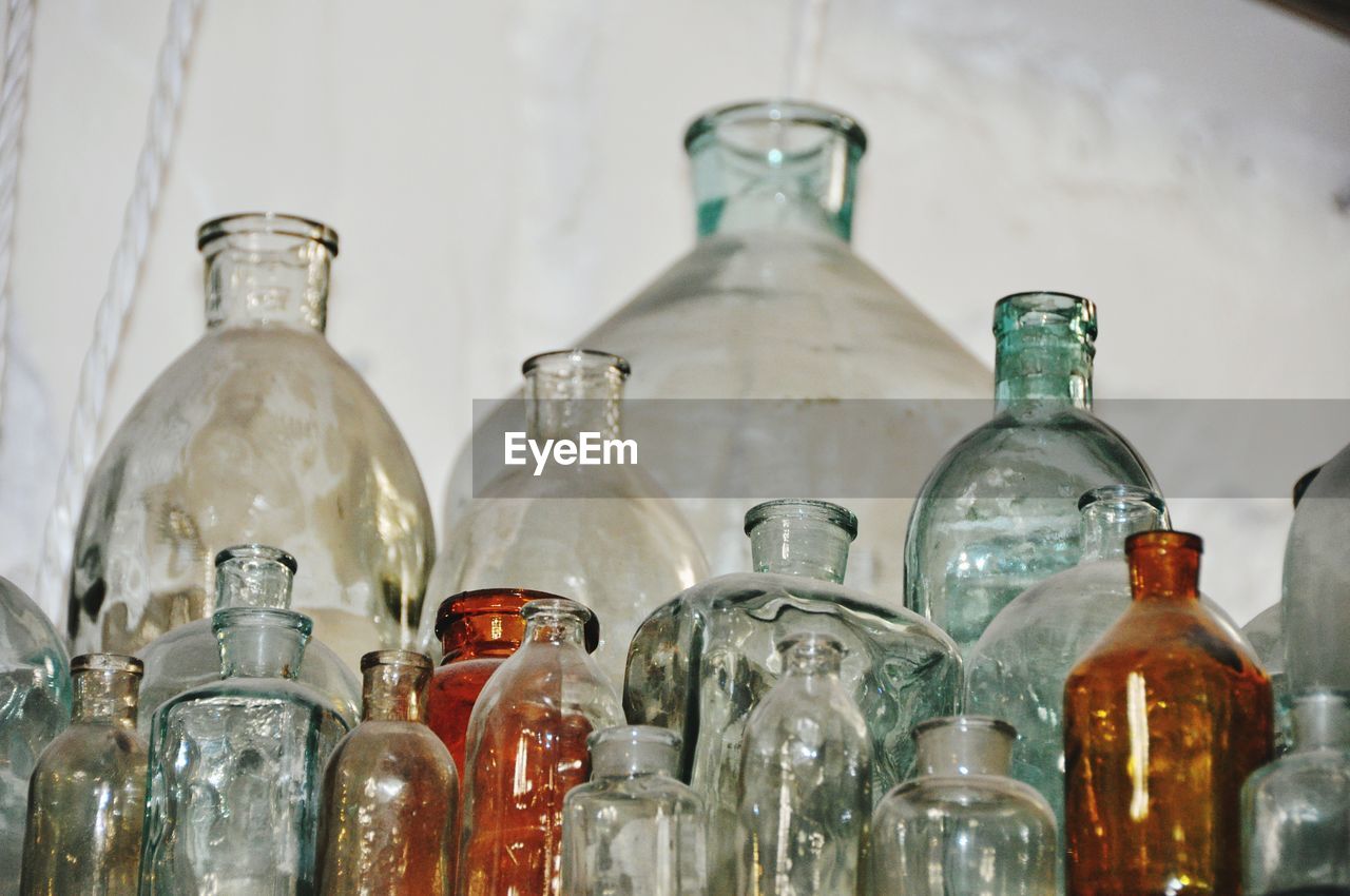 Close-up of old bottles