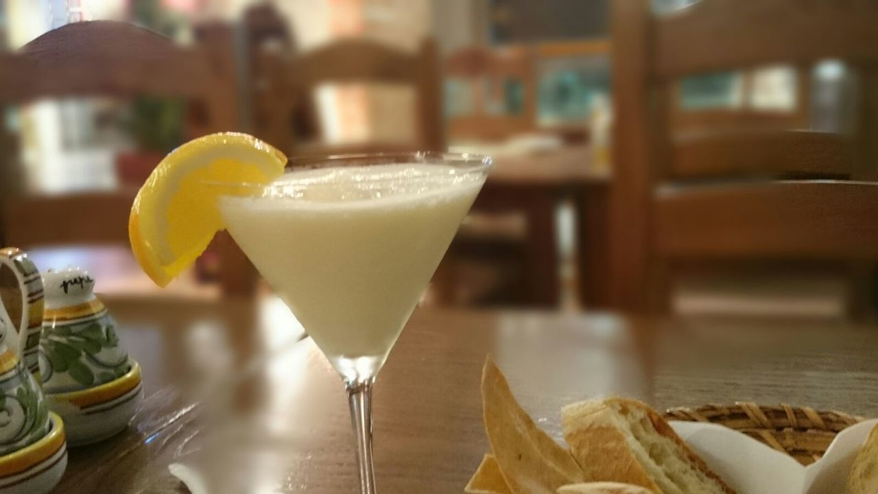 CLOSE-UP OF BEER IN GLASS OF BAR