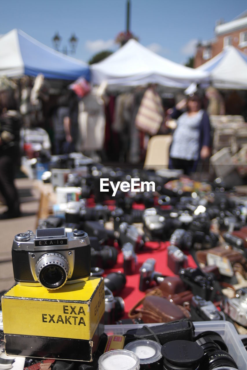 High angle view of cameras for sale at market