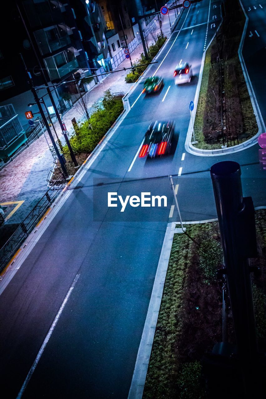 TRAFFIC ON ROAD AT NIGHT