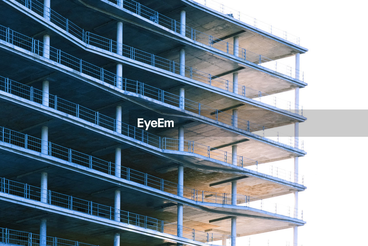 LOW ANGLE VIEW OF APARTMENT BUILDING