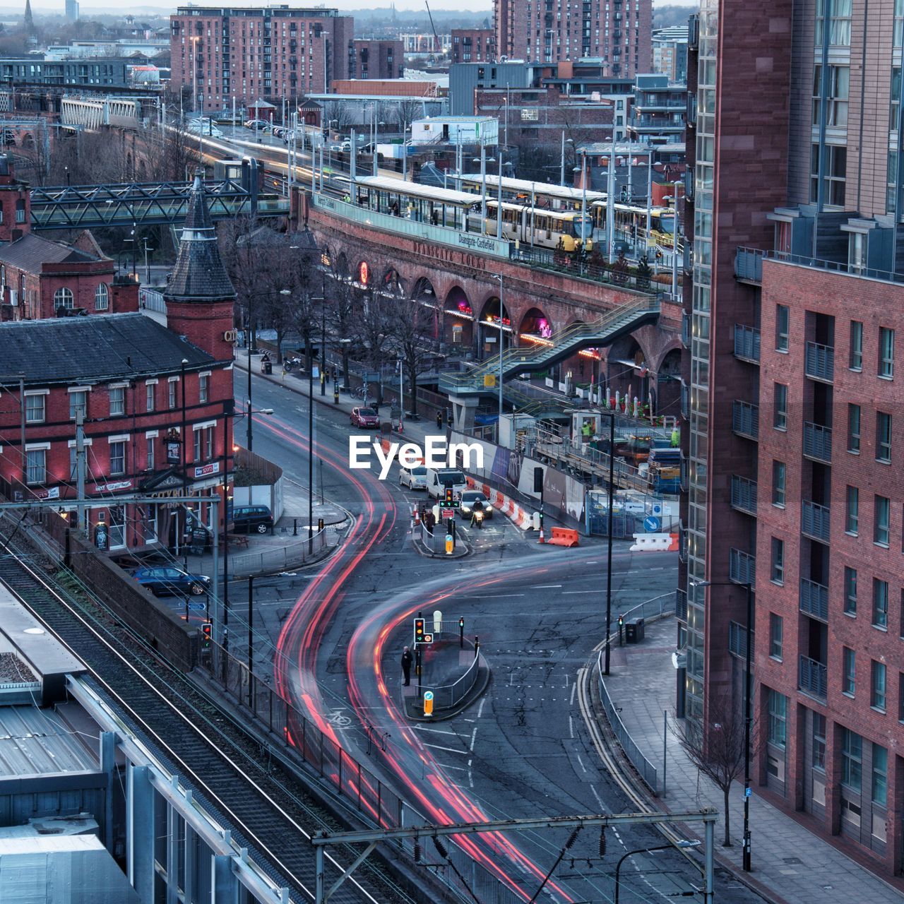 High angle view of light trails on road in city