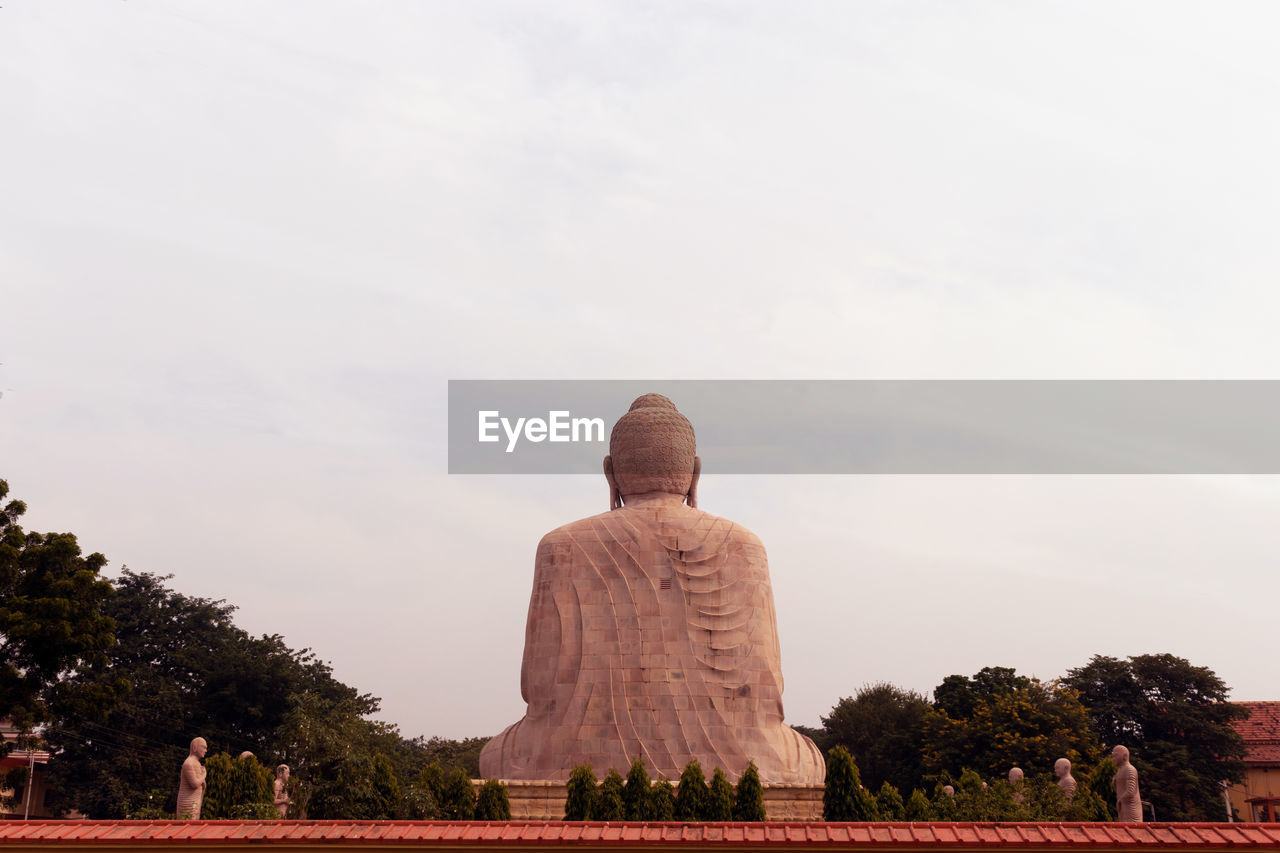 Giant buddha statue from different angles