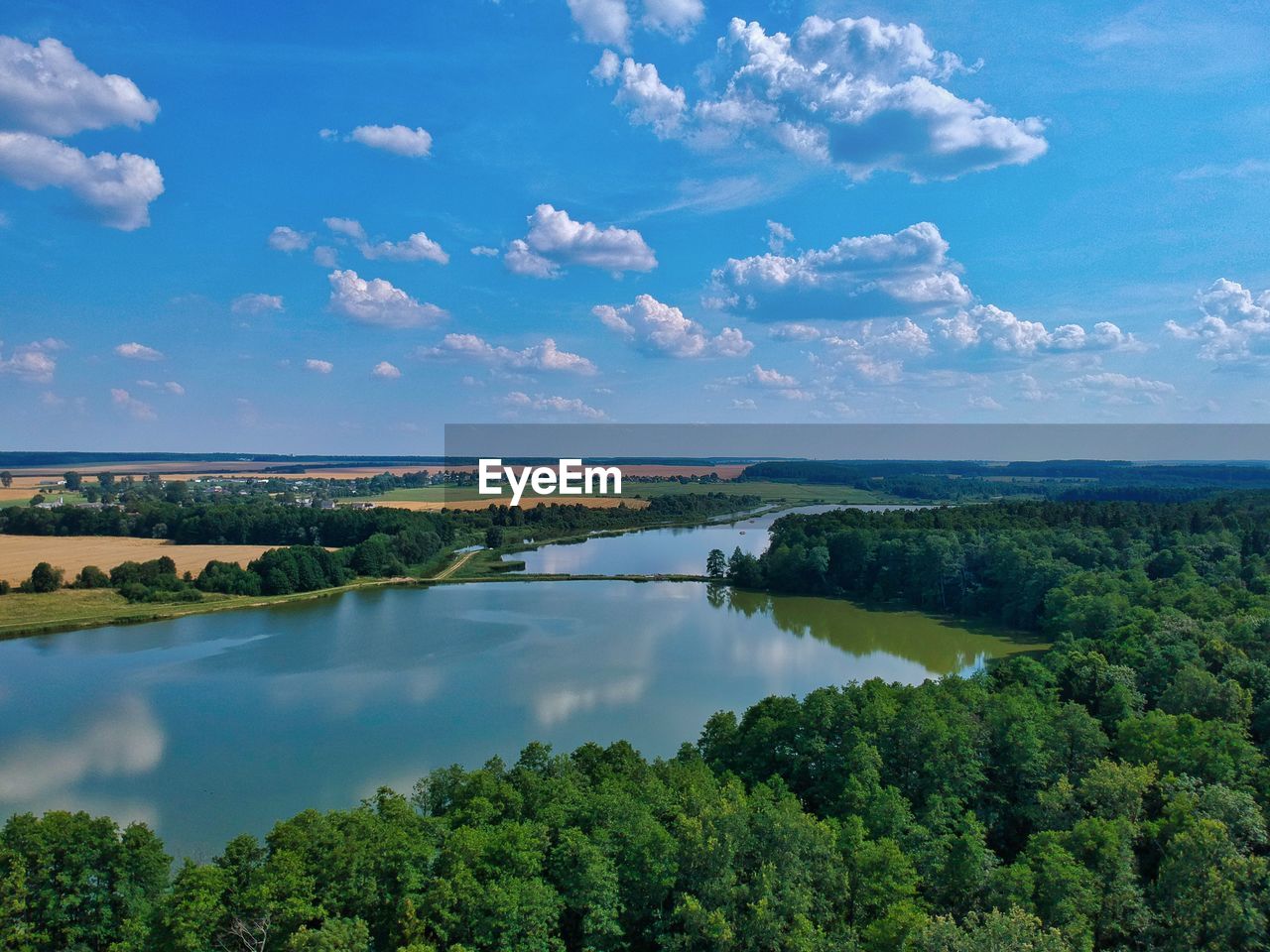 SCENIC VIEW OF GREEN LANDSCAPE AGAINST SKY