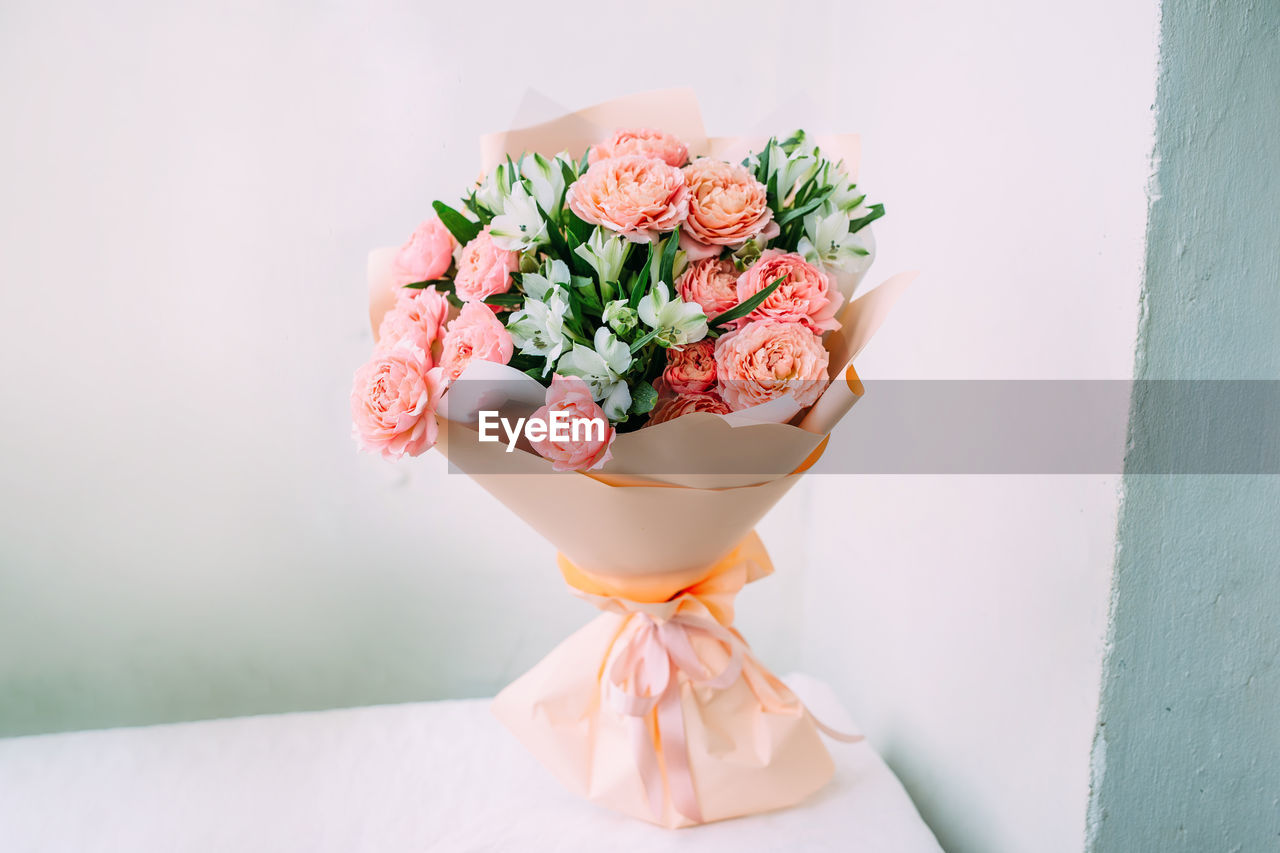 Luxurious bouquet of fresh pastel pale pink roses