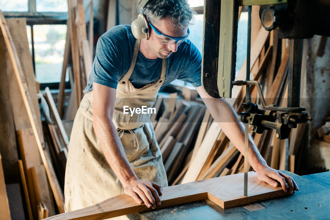 Carpenter working in workshop