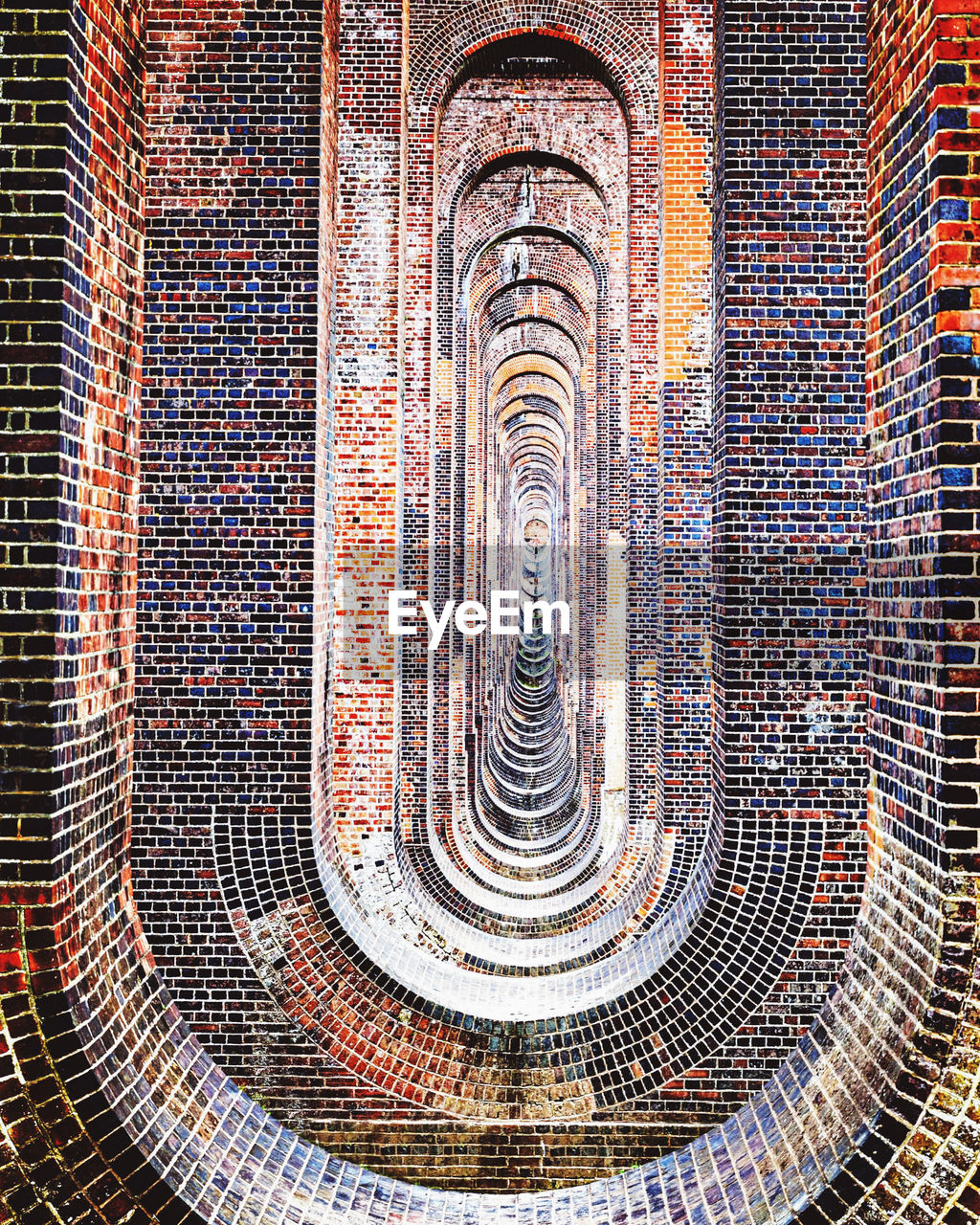 HIGH ANGLE VIEW OF SPIRAL STAIRCASE OF BUILDING