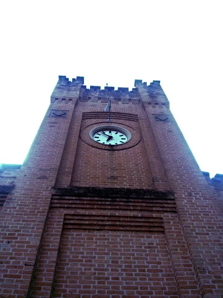 LOW ANGLE VIEW OF CLOCK TOWER WITH CLOCK TOWER