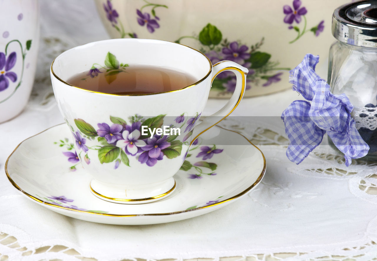 Close-up of an elegant tea cup on saucer