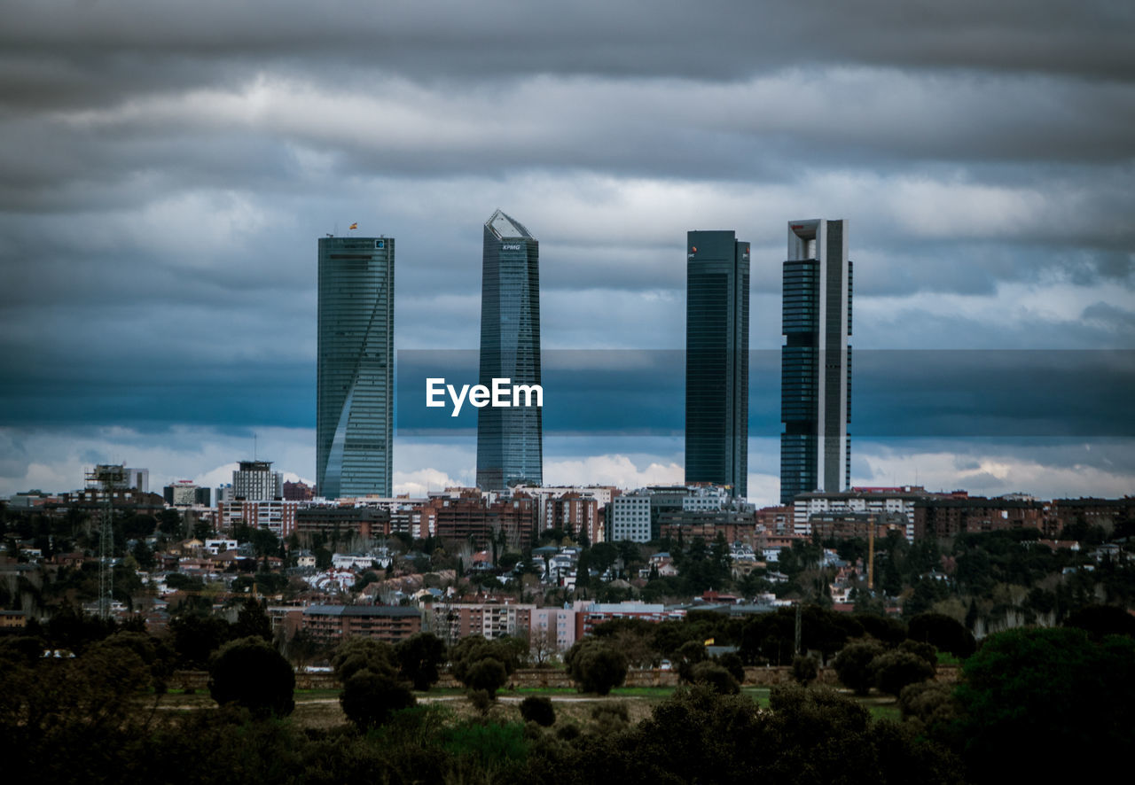 MODERN BUILDINGS AGAINST SKY