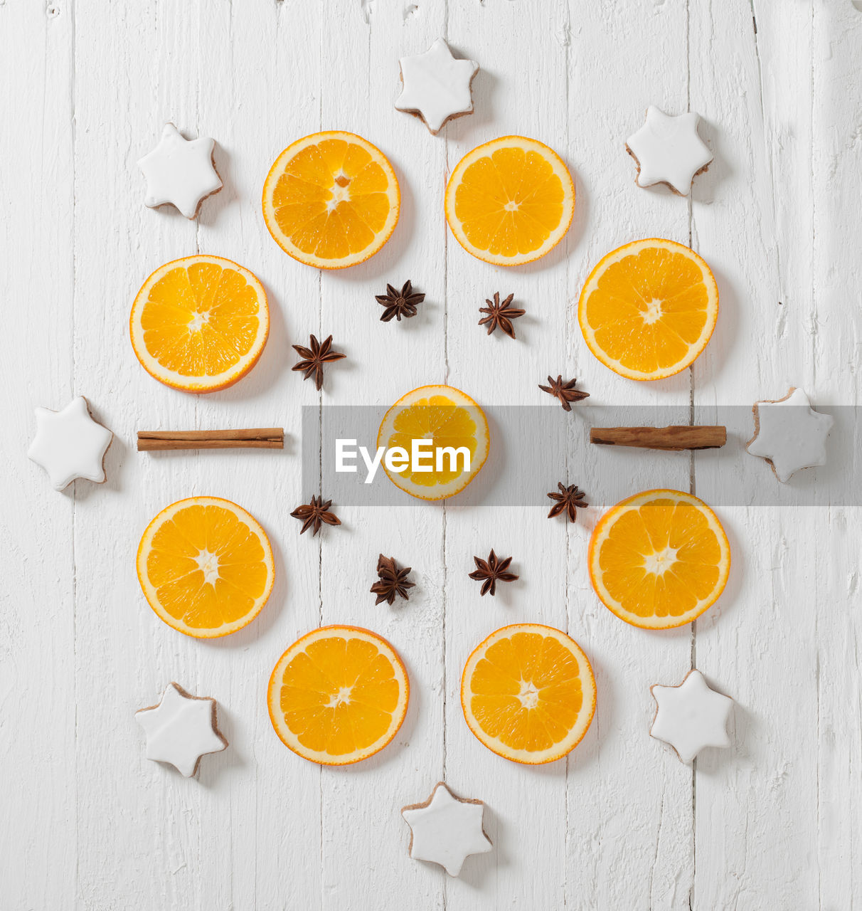 HIGH ANGLE VIEW OF FRUITS SERVED ON TABLE AGAINST WHITE BACKGROUND