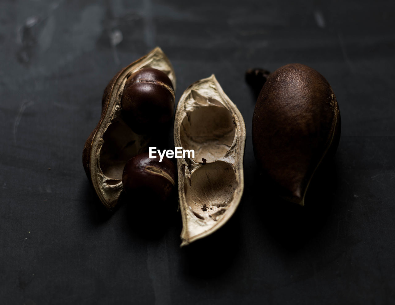 High angle view of seed pods on table