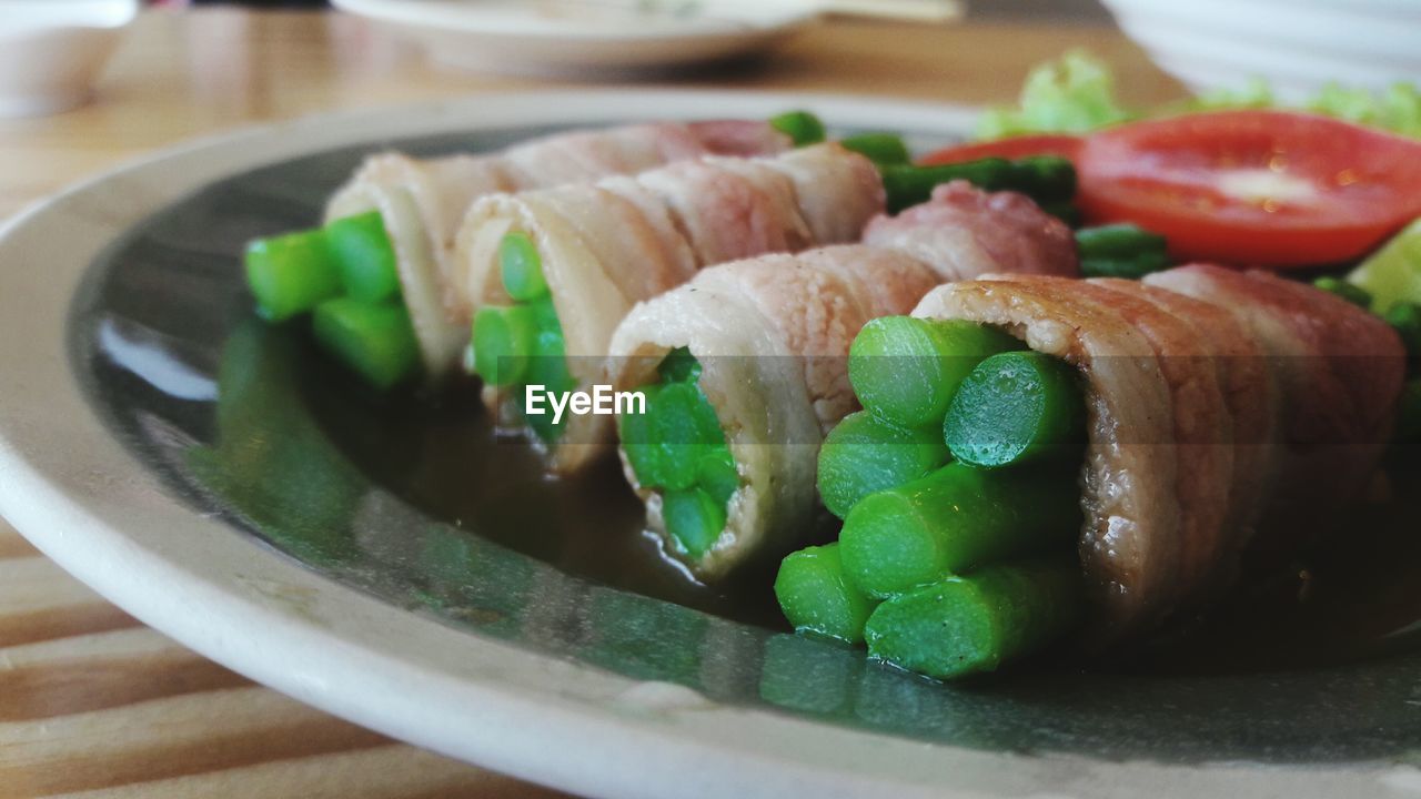 CLOSE-UP OF SUSHI SERVED ON PLATE