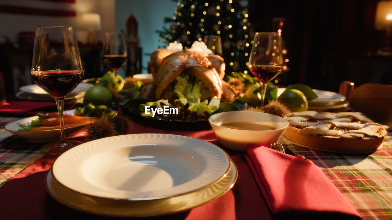 Thanksgiving dinner table with food set for