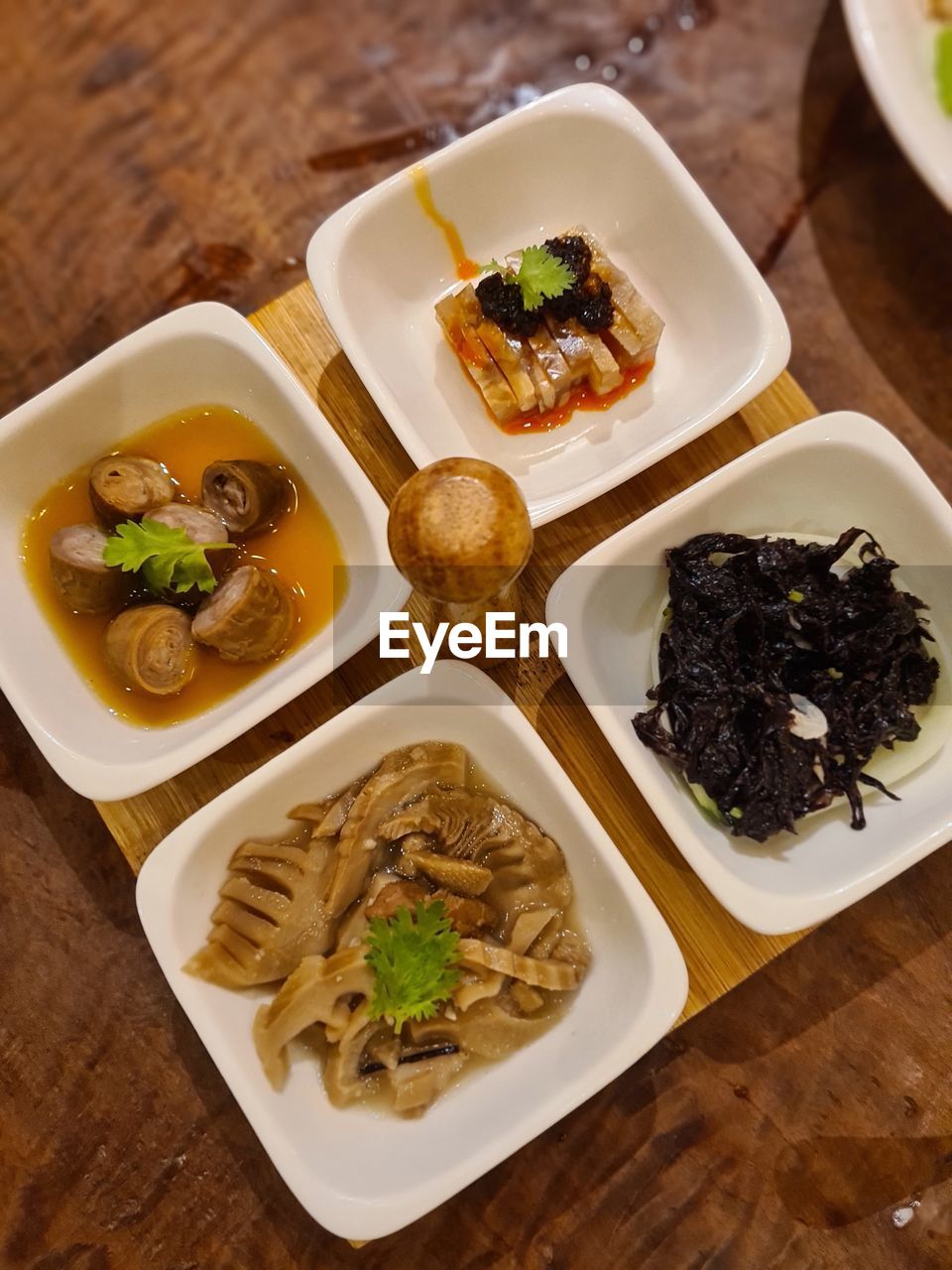 food and drink, food, healthy eating, freshness, dish, table, no people, asian food, meal, wood, lunch, high angle view, cuisine, vegetable, wellbeing, plate, indoors, bowl, still life, italian food, restaurant