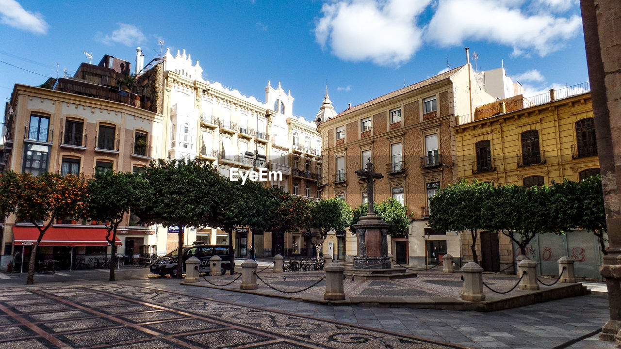 BUILDINGS AGAINST SKY