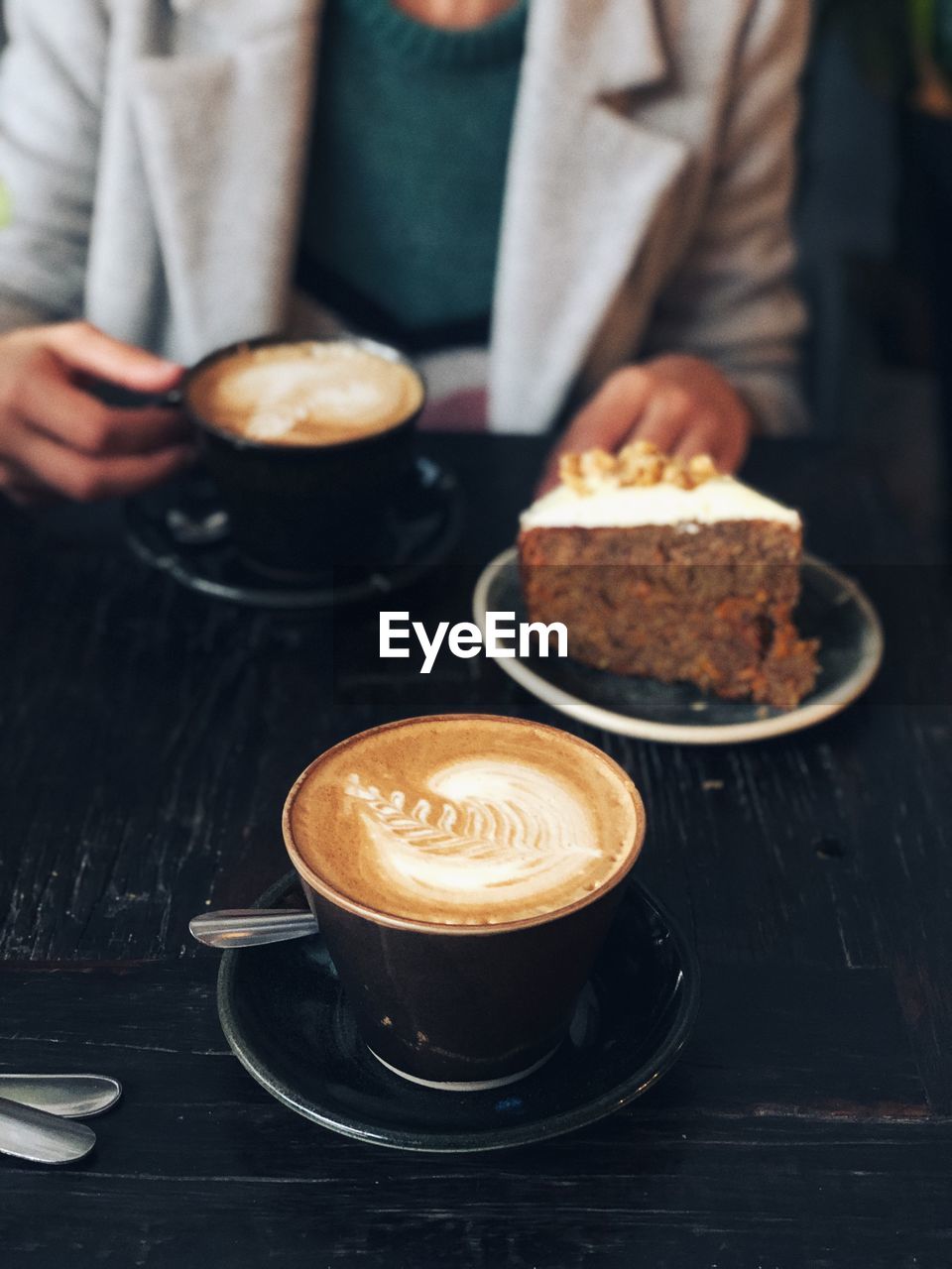 Close-up of coffee cup on table