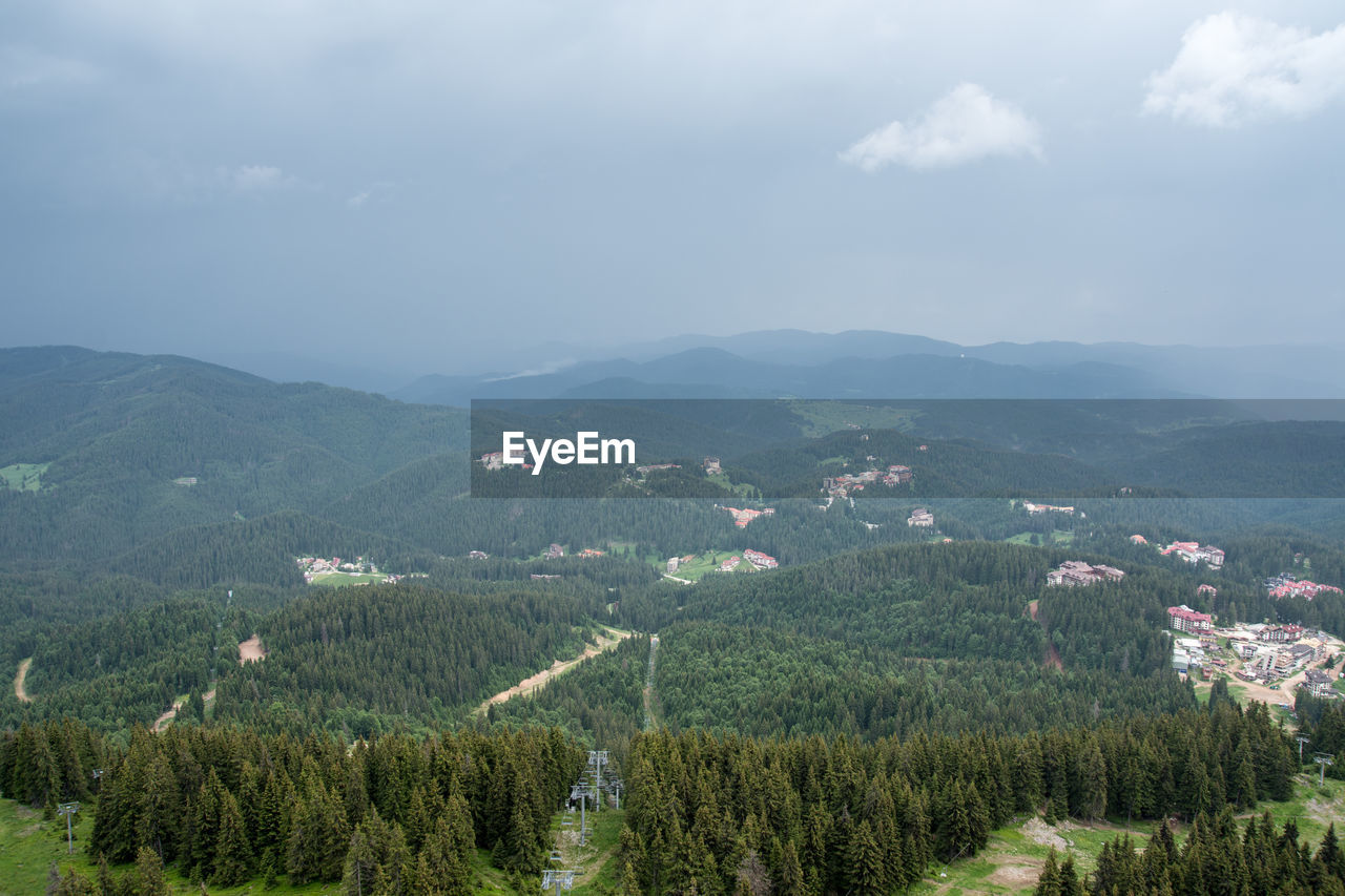 Scenic view of agricultural landscape against sky