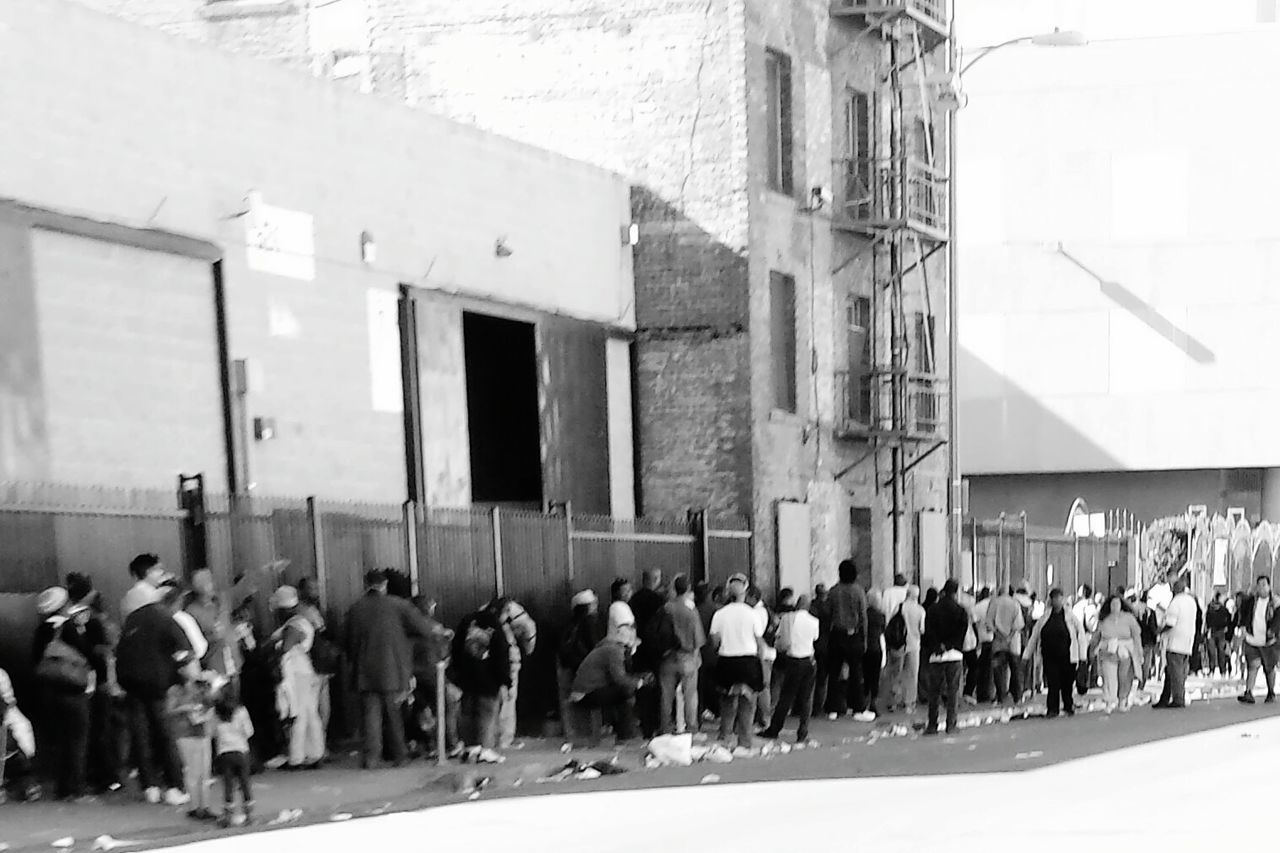 PEOPLE IN FRONT OF BUILDING