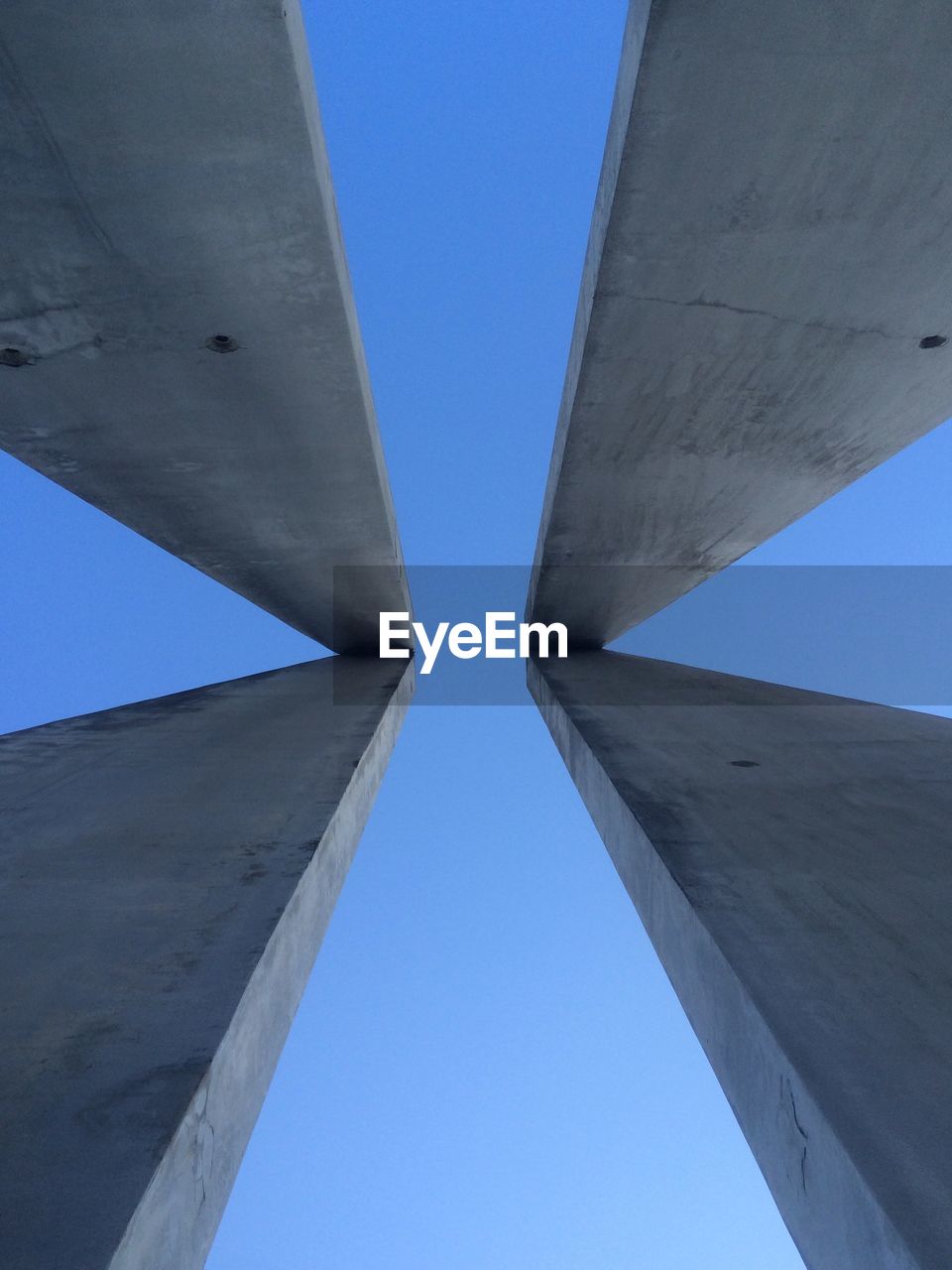 Low angle view of columns against clear sky