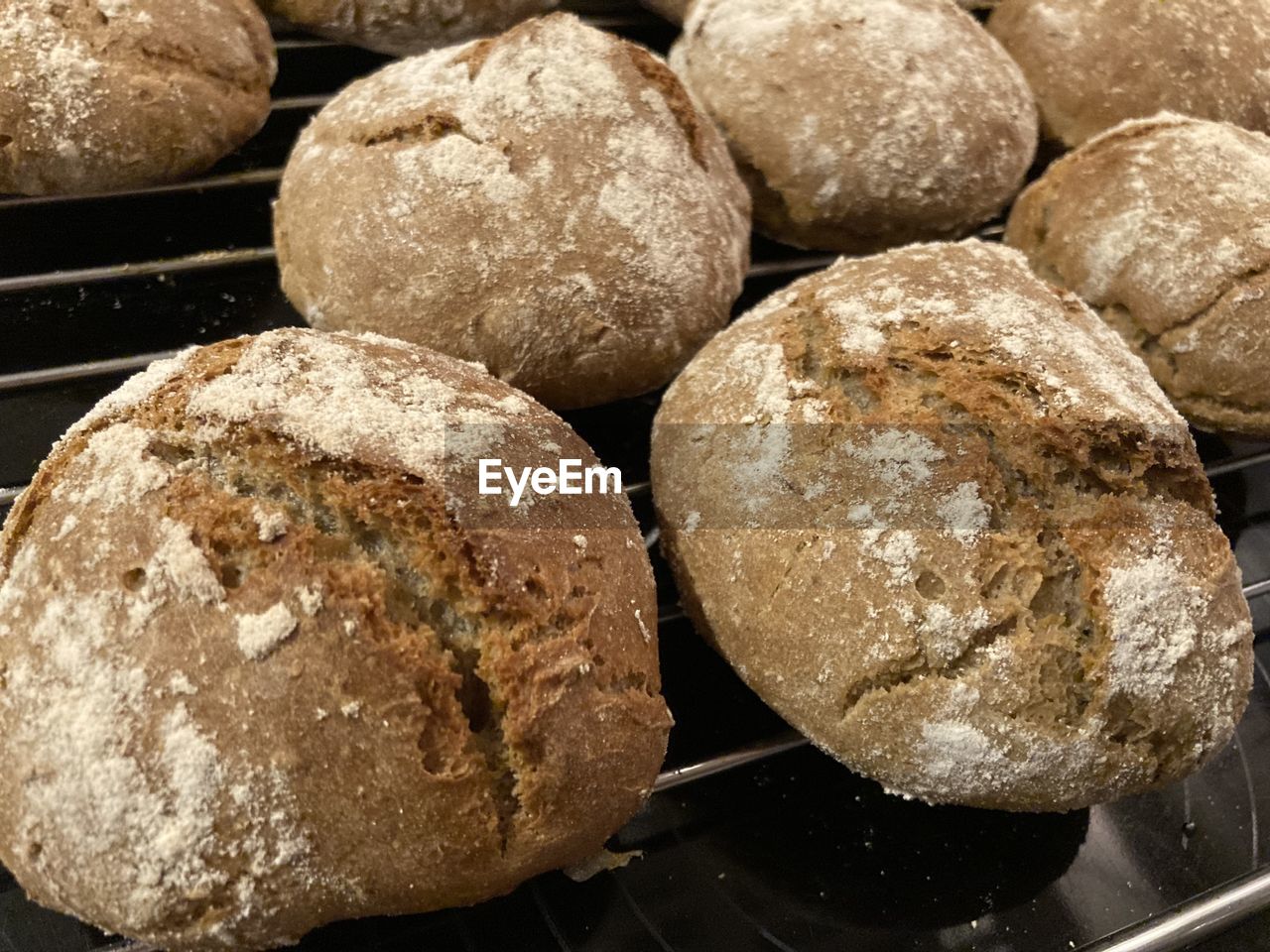 food, food and drink, rye bread, freshness, bread, sourdough, baked, whole grain, brown bread, loaf of bread, no people, wellbeing, close-up, healthy eating, store, ciabatta, still life, bakery, indoors, brown, fast food, soda bread, appliance, baking bread, high angle view, dessert