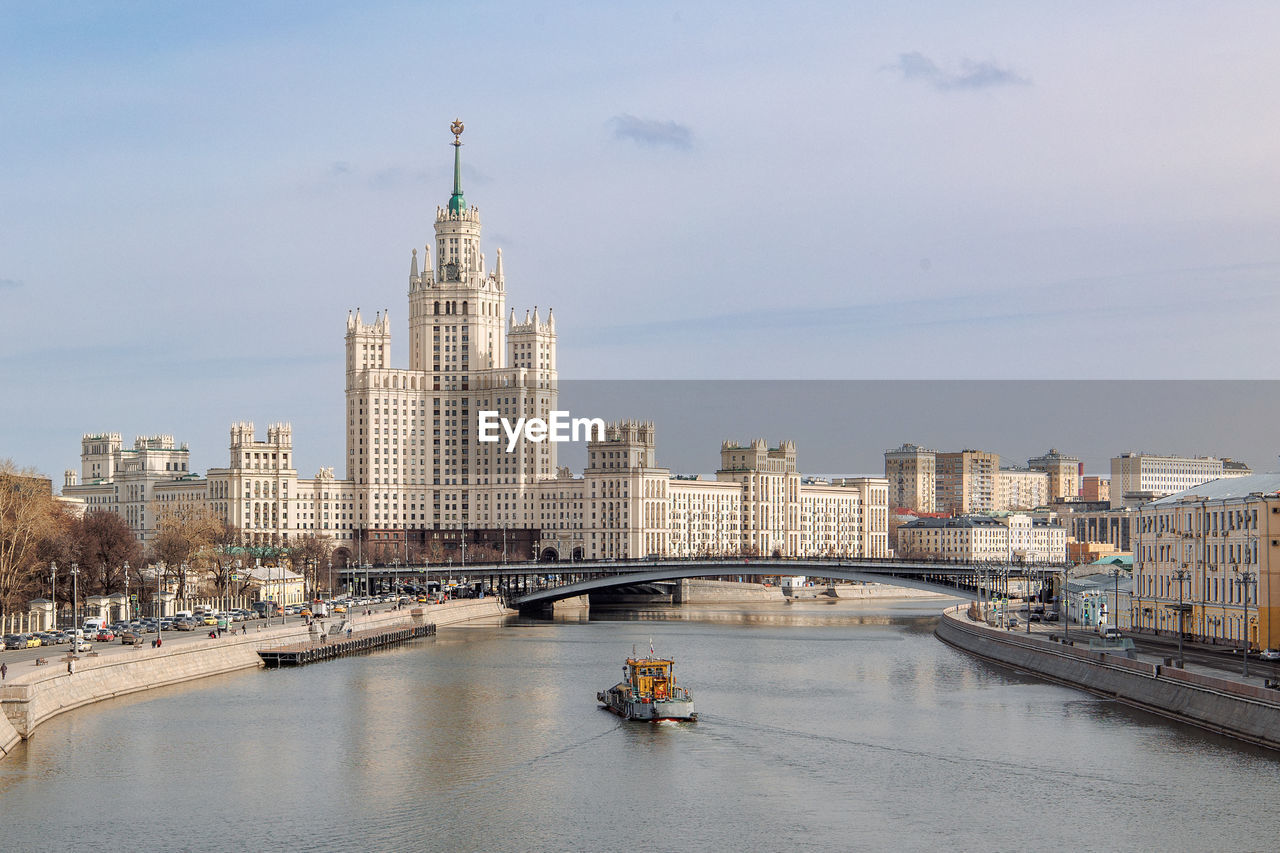 Panoramic view of kotelnicheskaya embankment building from zaryadye park. people on 