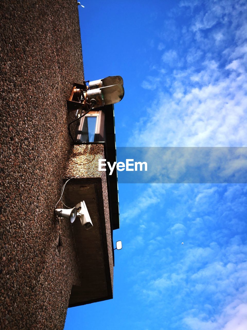 LOW ANGLE VIEW OF METALLIC STRUCTURE AGAINST SKY