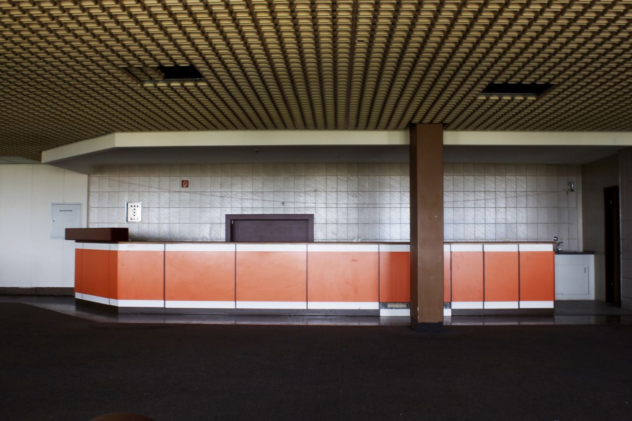 Empty subway with tiled wall