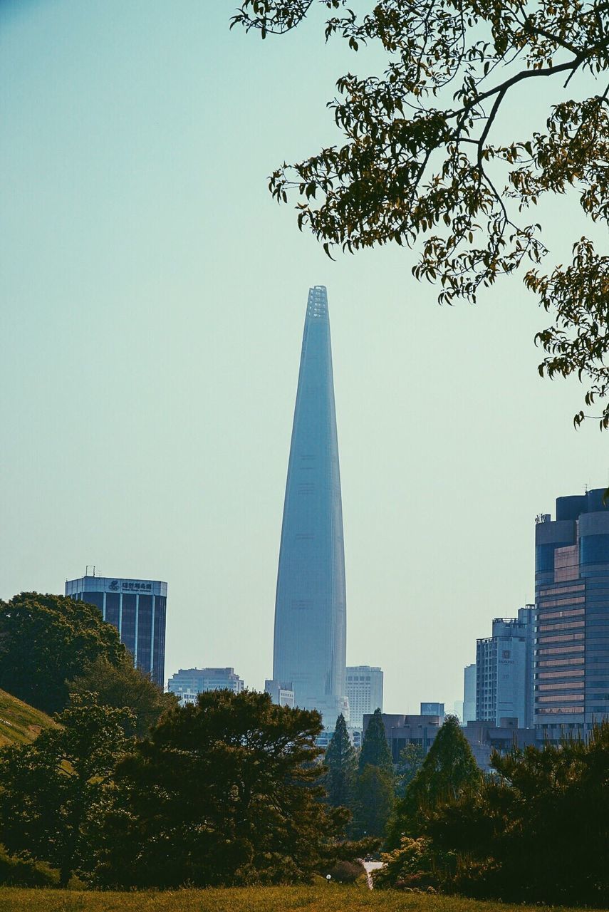 MODERN CITY AGAINST CLEAR SKY