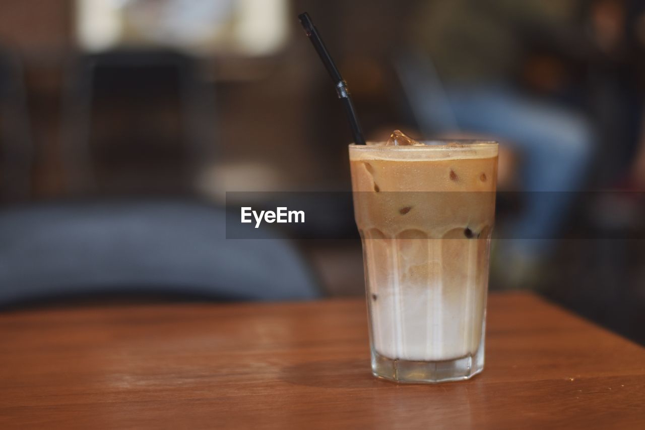 Close-up of iced coffee on table
