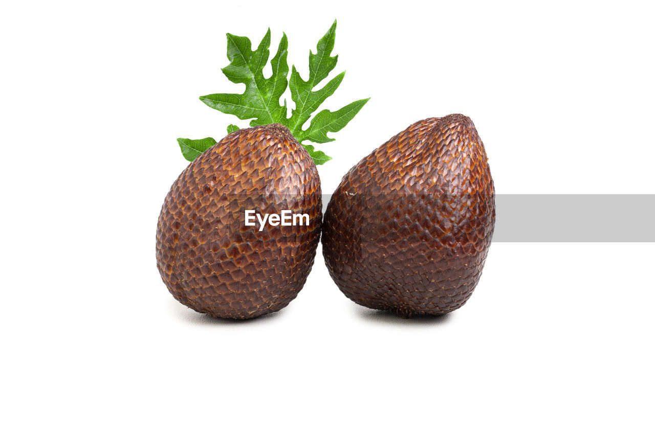 Salak or snake fruit isolated on white background