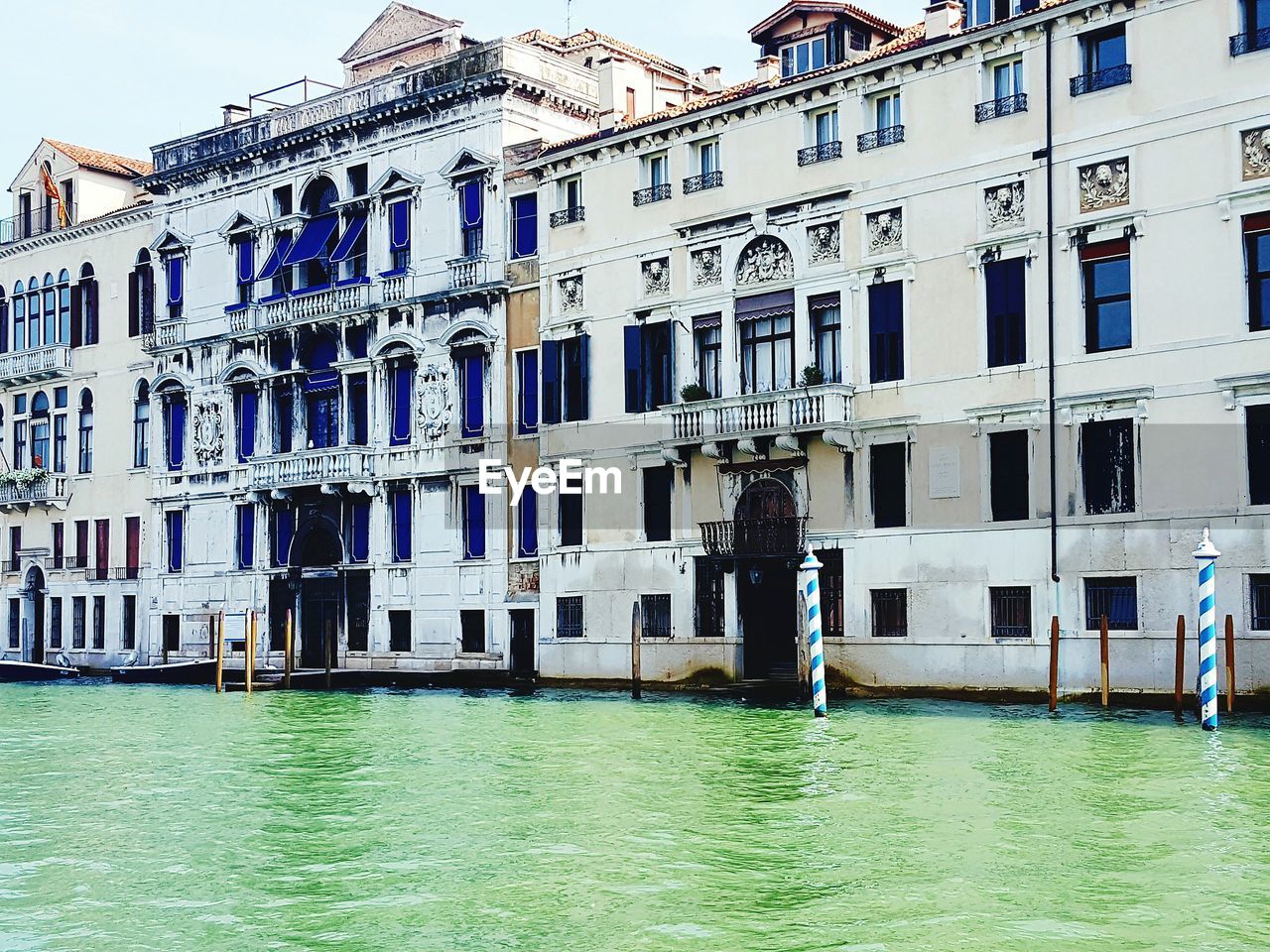 VIEW OF BUILDINGS BY CANAL