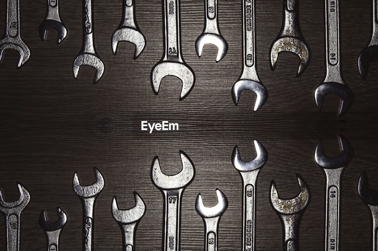 Directly above shot of tools on wooden table